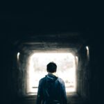 man standing in subway